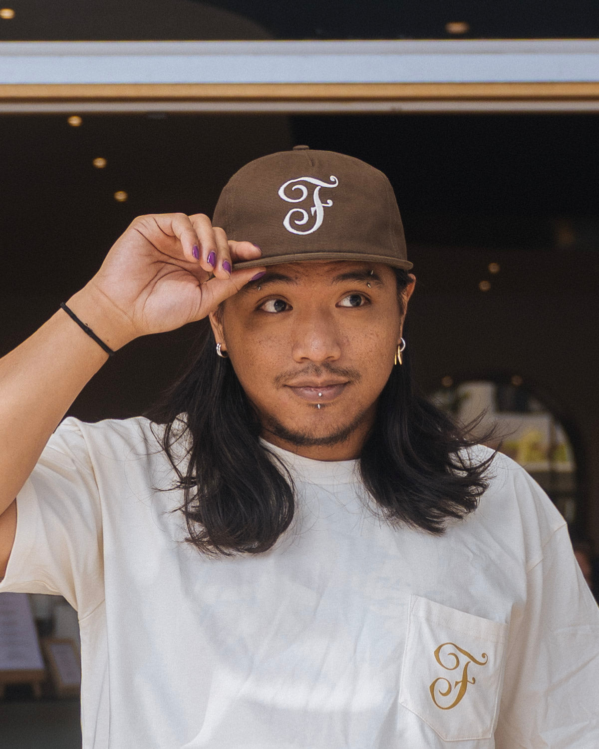 Brown F logo hat